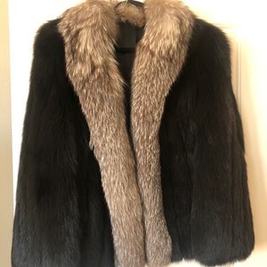 Black fox coat with silver fox collar.